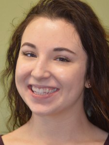 Woman before Upper Porcelain (2) Veneers and Invisalign